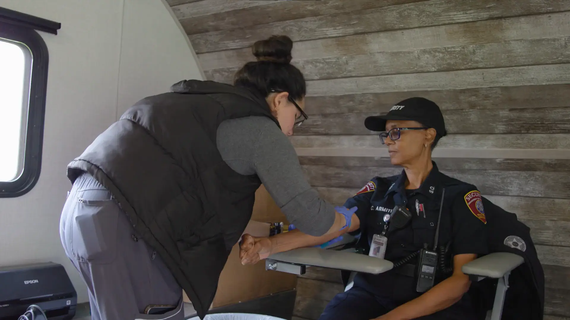 Woman sitting for a blood draw